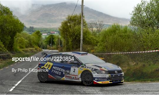 a photo of a rally car racing in the rally of the lakes.