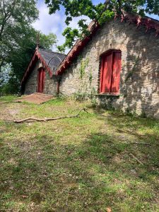 red barn doors on a boathouse