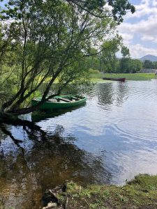 a boat floating on a lake