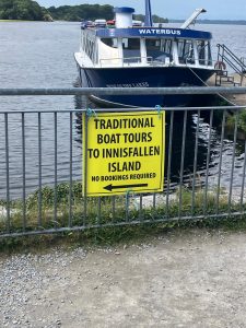 a sign saying tradionatl boat tours to innisfallen island